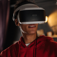 Guy wearing virtual reality glasses